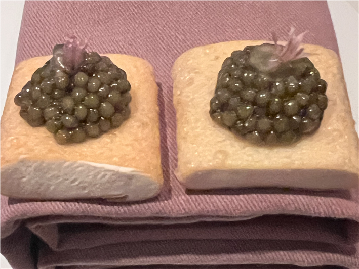 onion and caviar canape